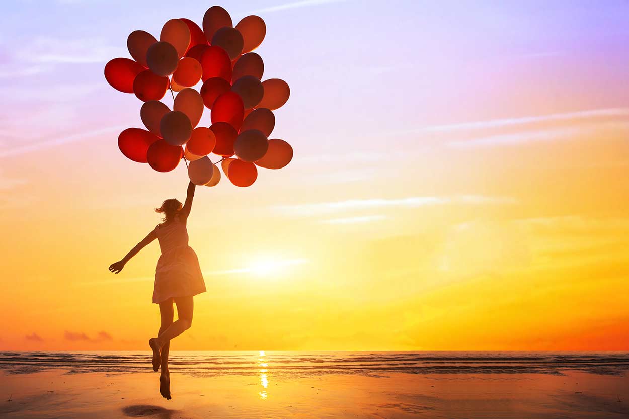 depression after quitting smoking woman flying free with balloons