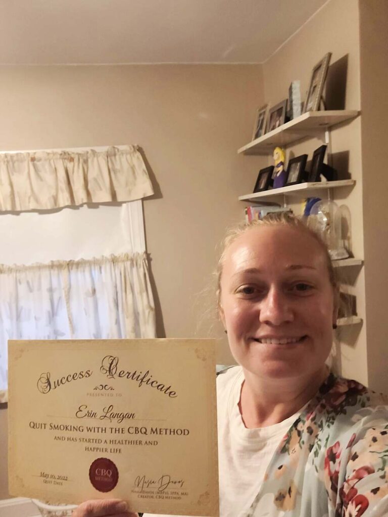 Erin Langan holding her CBQ Success Certificate